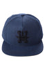 The HUF x Snoop 420 Snapback Hat in Navy Heather